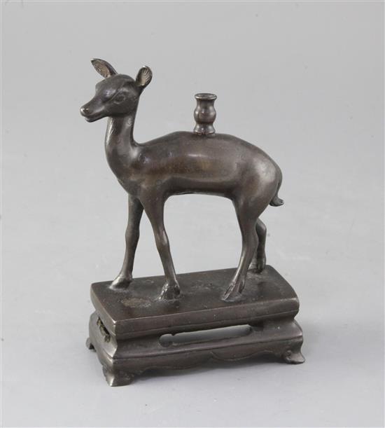 A Chinese bronze deer joss stick holder, 18th century, height 15cm